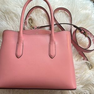 Kate spade purse used once, with small smudge on back.